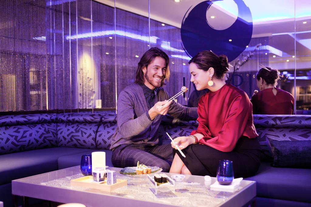 The Domain Bahrain Hotel And Spa - Adults Friendly 16 Years Plus マナーマ エクステリア 写真 A couple dining at the restaurant