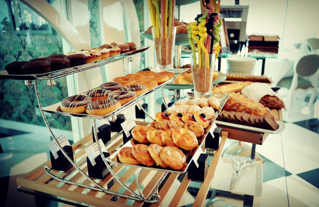 The Domain Bahrain Hotel And Spa - Adults Friendly 16 Years Plus マナーマ エクステリア 写真 A buffet of pastries